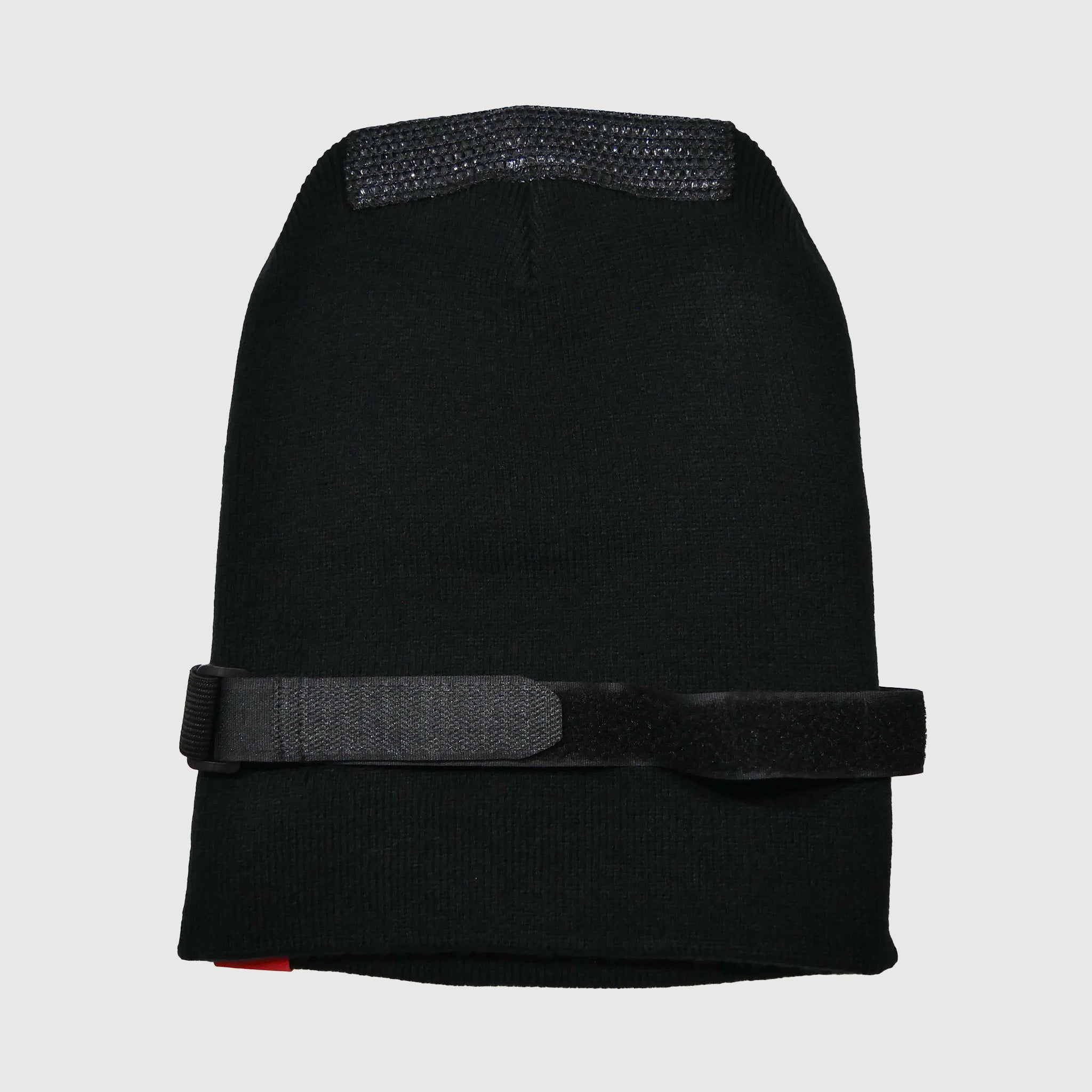Backside of Spin Control and Forget Never Collaboration Premium Spin Cap Beanie showing the elastic strap from the back.